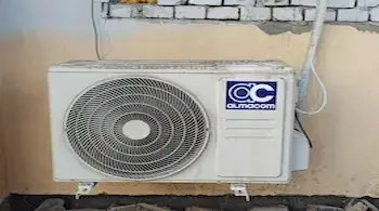 RV AC repair technician diagnosing air conditioning problems in Yuma AZ